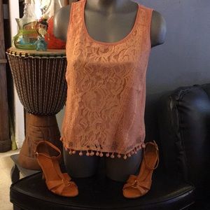 Peach color tank blouse n shoes are separated